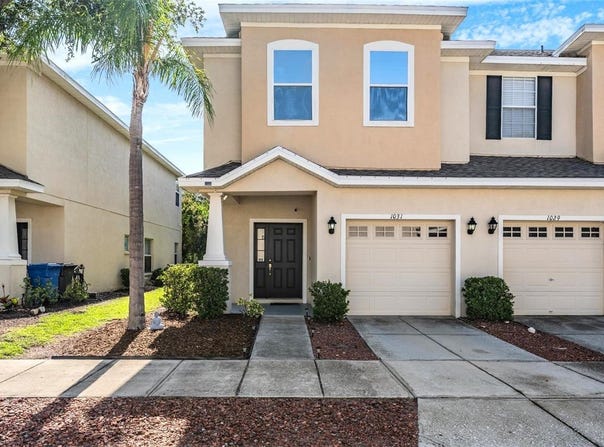 1031 ANDREW AVILES CIRCLE, TAMPA, FL 33619