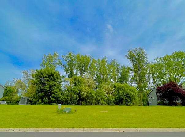 349 Creekside Drive, Coopersville, MI 49404