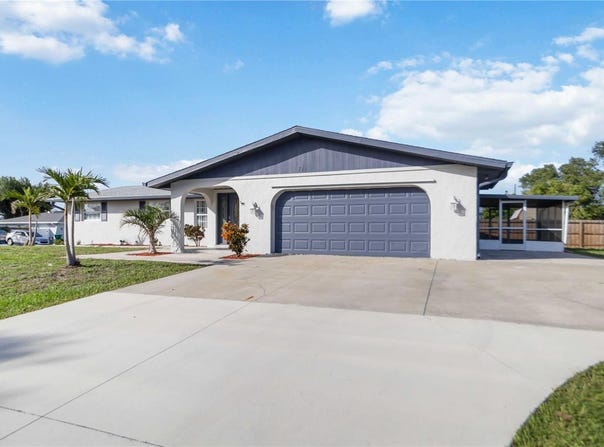 711 FOREST HILL LANE NW, PORT CHARLOTTE, FL 33948