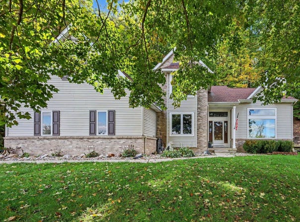 8824 Grand River Drive SE, Ada, MI 49301