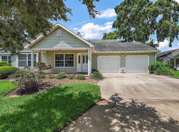 911 BEVERLY HARBORS DRIVE, LEESBURG, FL 34748