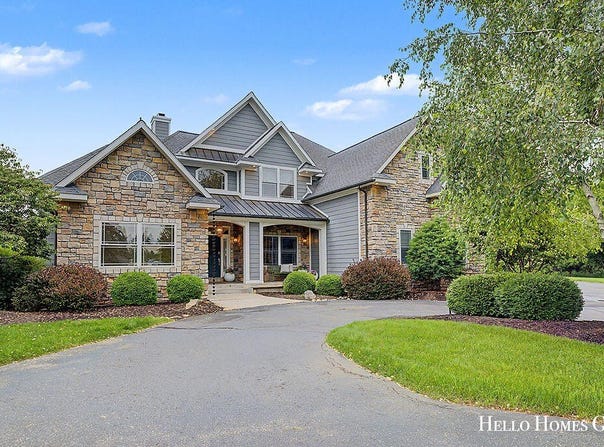5327 Canyon River Drive NE, Ada, MI 49301