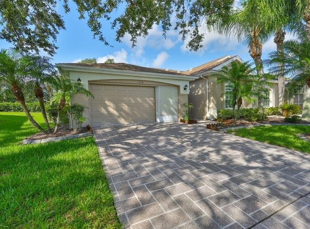 1112 MCDANIEL STREET, SUN CITY CENTER, FL 33573