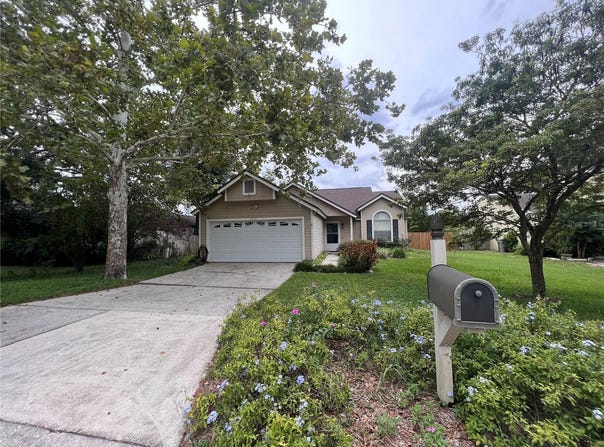 1049 WINDSONG CIRCLE, APOPKA, FL 32703