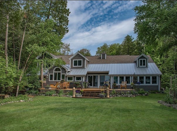 348 E SUGAR BAY LANE, CEDAR, MI 49621