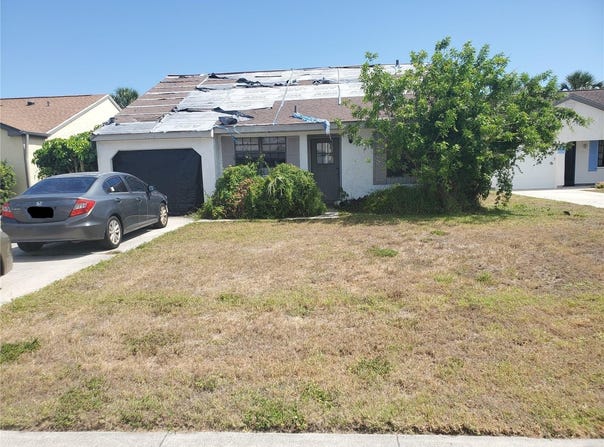 1236 E CORKTREE CIRCLE, PORT CHARLOTTE, FL 33952