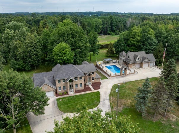 900 E Pine Grove Drive, Weidman, MI 48893