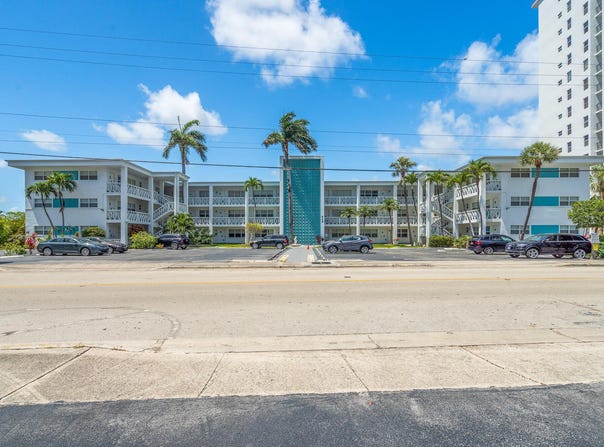 419 Golden Isles Drive, Hallandale Beach, FL 33009
