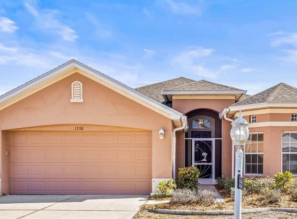 1330 MISTY GREENS DRIVE, SUN CITY CENTER, FL 33573