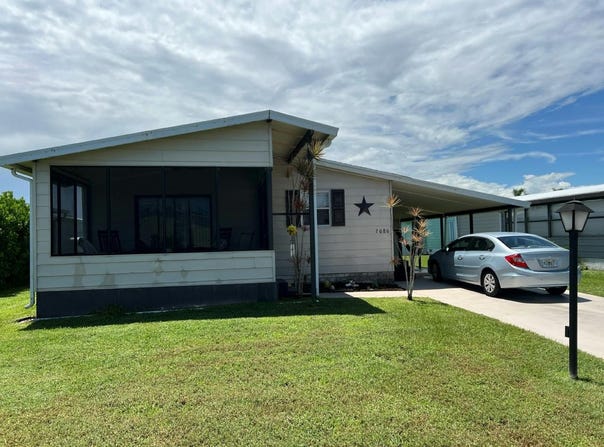 7080 SE CARROTWOOD LANE, Stuart, FL 34997