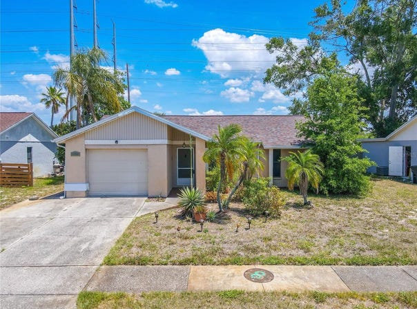1034 MANDARIN DRIVE, HOLIDAY, FL 34691