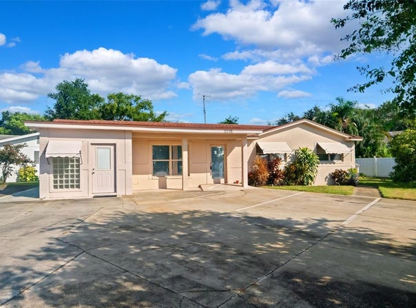 10701 VILLAGE GREEN AVENUE, SEMINOLE, FL 33772