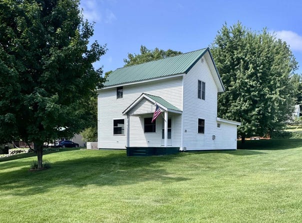 111 W FOREST HOME AVENUE, BELLAIRE, MI 49615