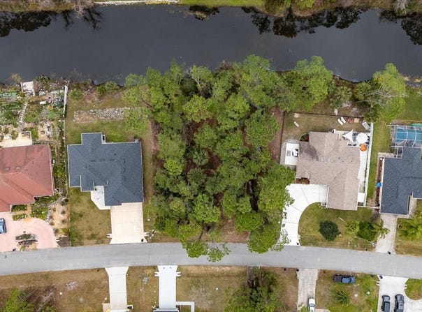 53 PHEASANT DRIVE, PALM COAST, FL 32164