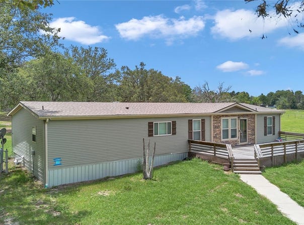 7565 DEWEY ROBBINS ROAD, HOWEY IN THE HILLS, FL 34737