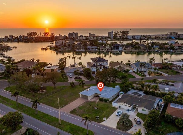 10100 PARADISE BOULEVARD, TREASURE ISLAND, FL 33706
