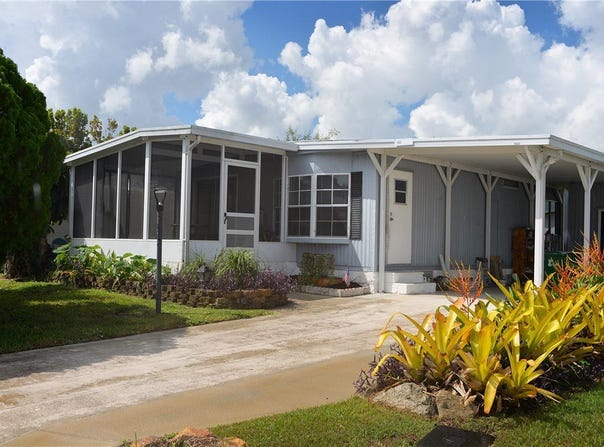 1023 Oriole Circle, Barefoot Bay, FL 32976