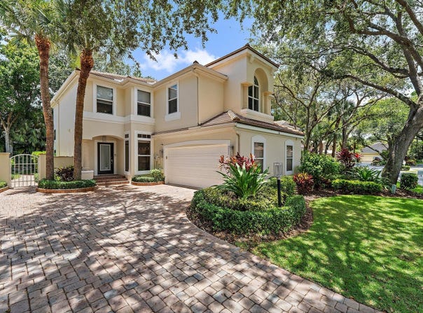 32 Grand Bay Circle, Juno Beach, FL 33408