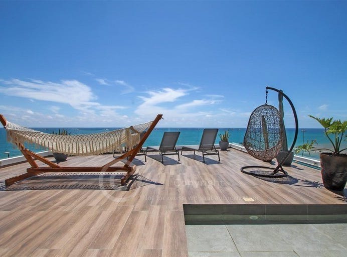 3 level Remarkable oceanfront custom pool home in prestigious gated