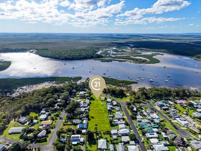 /international/au/24-26-oyster-parade-tin-can-bay-qld-204471764/