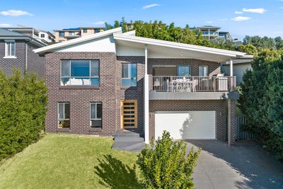/international/au/12-silkpod-street-figtree-nsw-151301488/