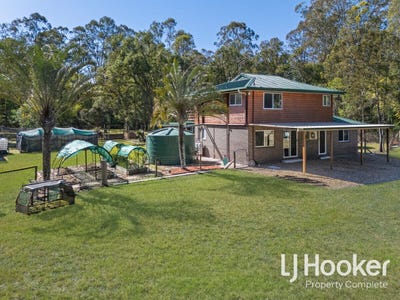 /international/au/322-kurrajong-road-jimboomba-qld-148624400/