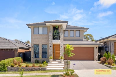 /international/au/29-crowley-boulevard-claymore-nsw-148385192/