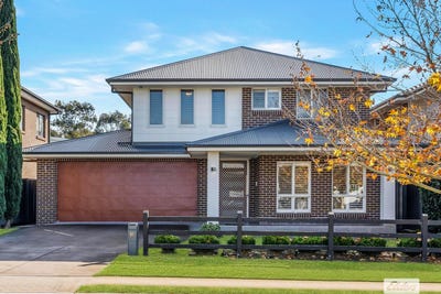 /international/au/18-pennyroyal-boulevard-denham-court-nsw-148357888/