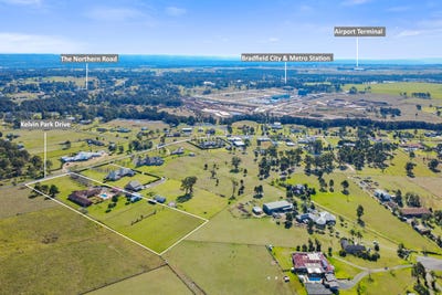 /international/au/7-kelvin-park-drive-bringelly-nsw-152727652/