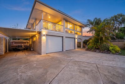 /international/au/14-kilmartin-esplanade-biggera-waters-qld-151418780/