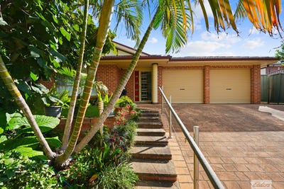 /international/au/9-coco-drive-glenmore-park-nsw-151185360/