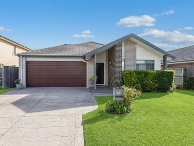 /international/au/31-grenada-road-glenfield-nsw-151425700/
