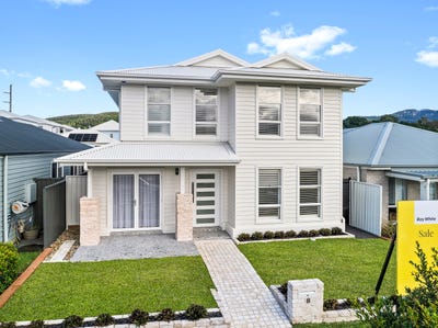 /international/au/8-braemar-street-tullimbar-nsw-151209536/