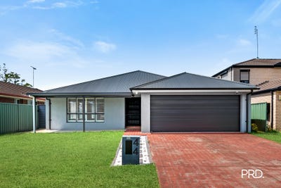 /international/au/44-monarch-circuit-glenmore-park-nsw-151255908/