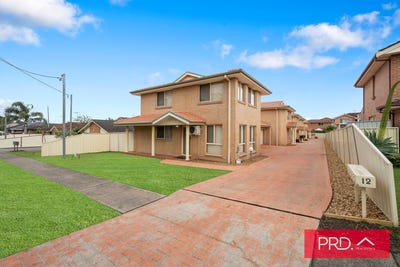 /international/au/12-thelma-street-lurnea-nsw-148504204/