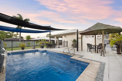 /international/au/21-woodwark-drive-bushland-beach-qld-151060436/
