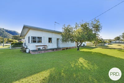 /international/au/7-castle-street-laurieton-nsw-148472724/?lang=en