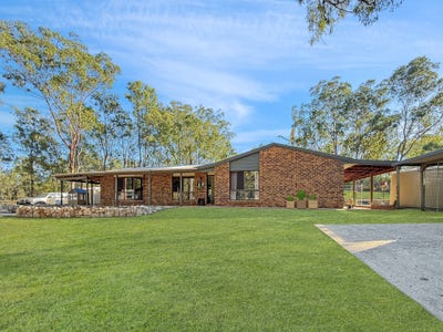 /international/au/15-rosella-avenue-regency-downs-qld-150879400/