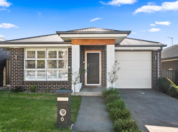 6 Coral Tree Crescent, Calderwood, NSW 2527